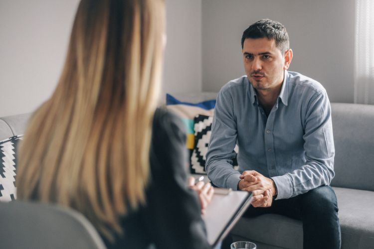 Man completing individual therapy at drug and alcohol rehab