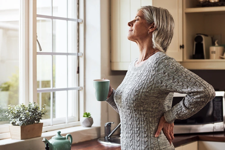 A woman going through alcohol addiction looking content after addiction treatment